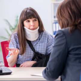 Injured patient from work consulting lawyer for claims.