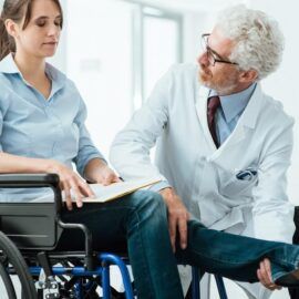 A woman consults her doctor about filing for social security disability in Pennsylvania.